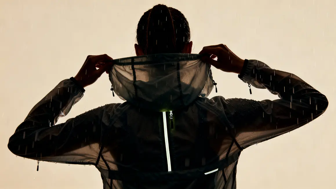 veste pluie running feminine reflet zip capuche